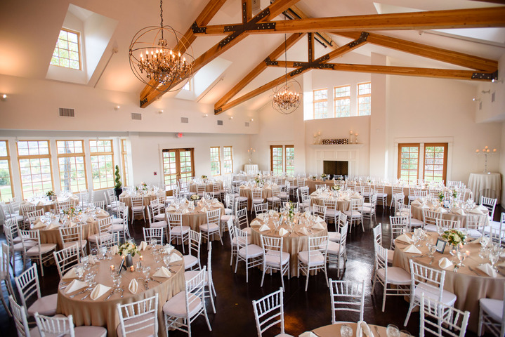 Indoor reception with exposed beams.