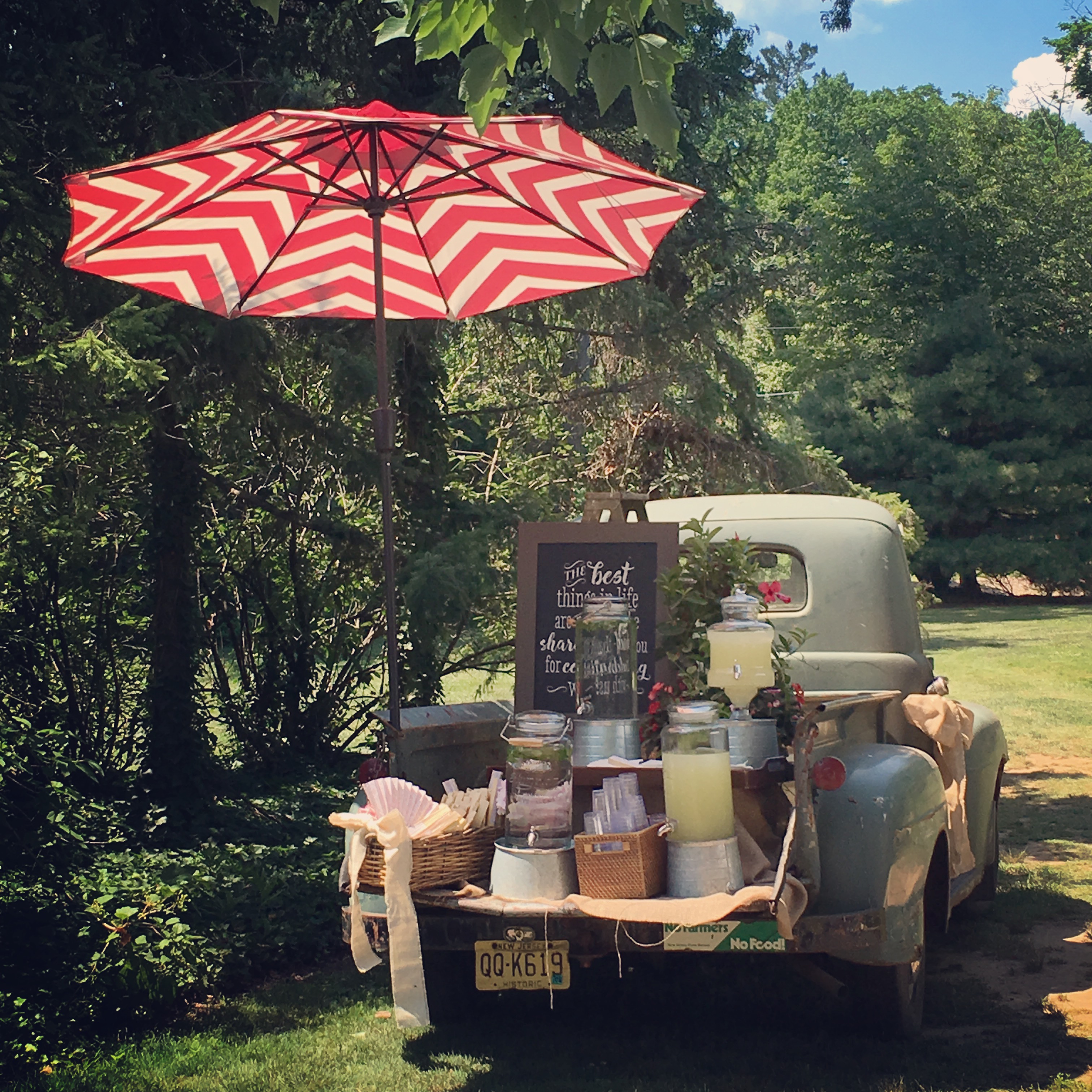It's always fun when a couple adds a welcome lemonade and herb water stand on this old pick up truck for their guests!
