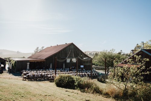 Outdoor dinner in front of the barn
