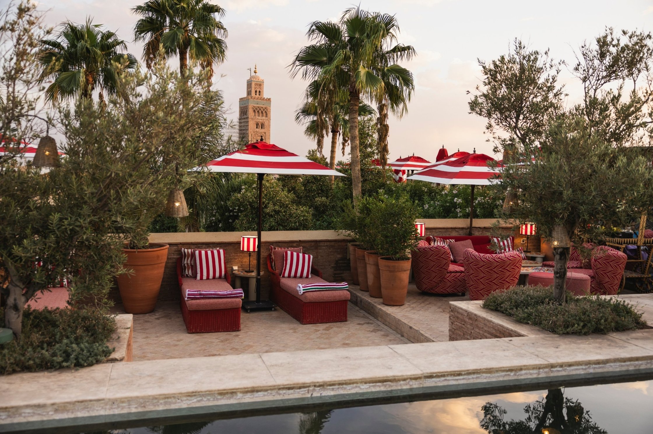 Rooftop sun terrace with heated pool and views to the koutoubia.